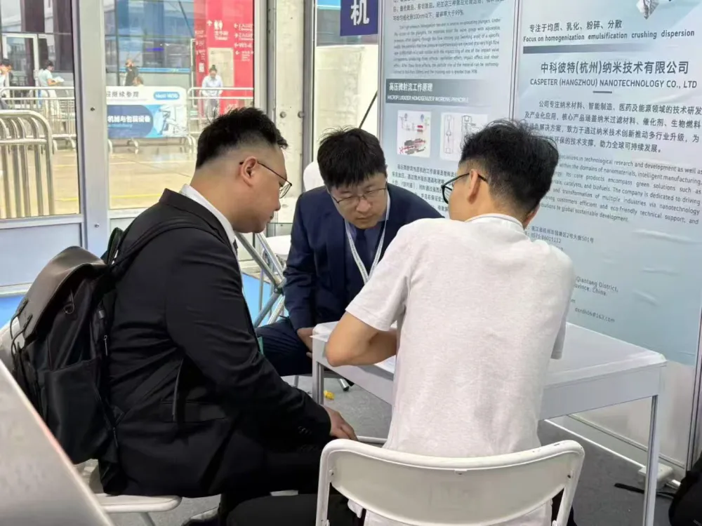 CAS PETER team meeting visitors at an exhibition