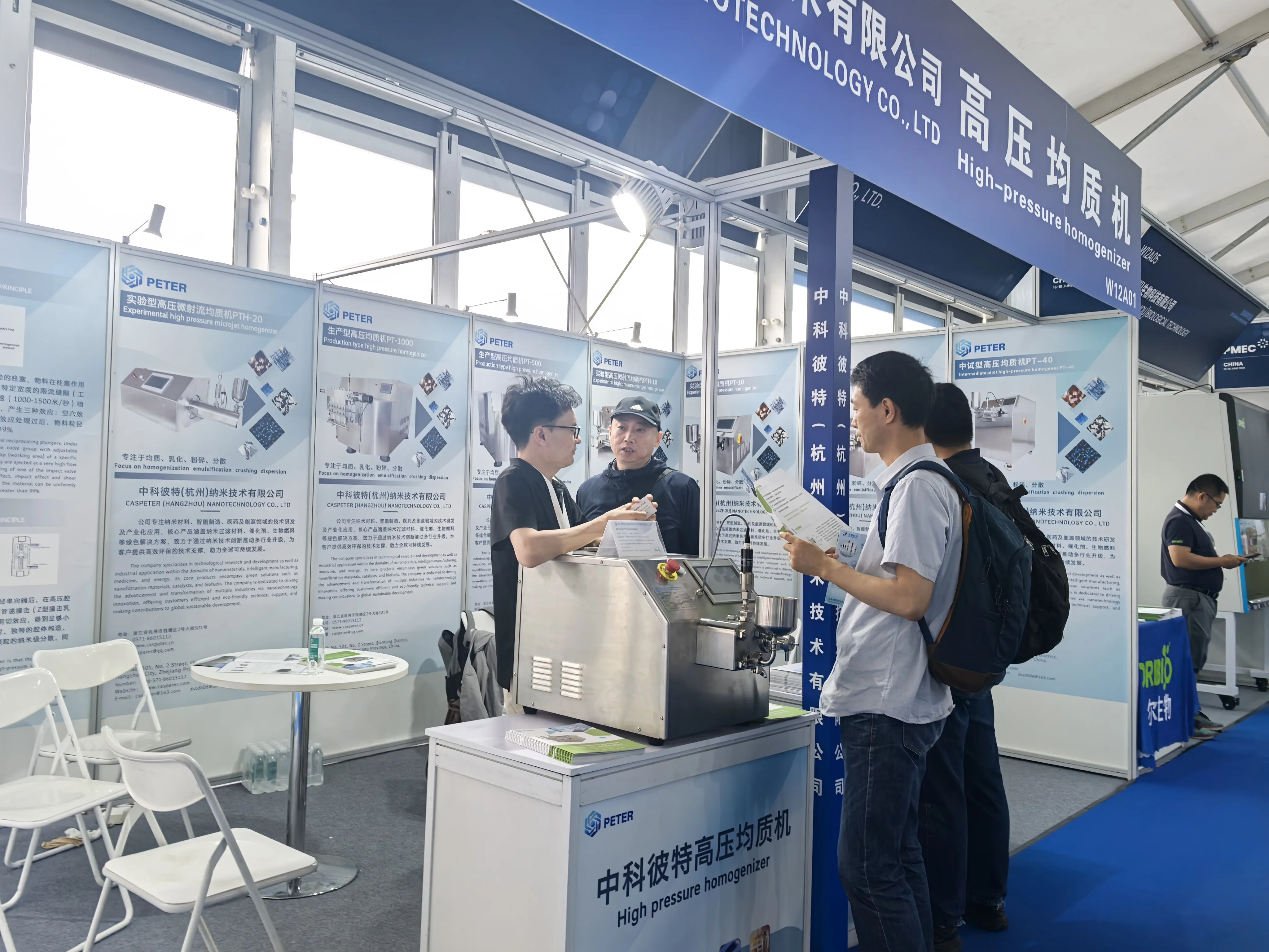 CAS PETER team presenting equipment to exhibition visitors